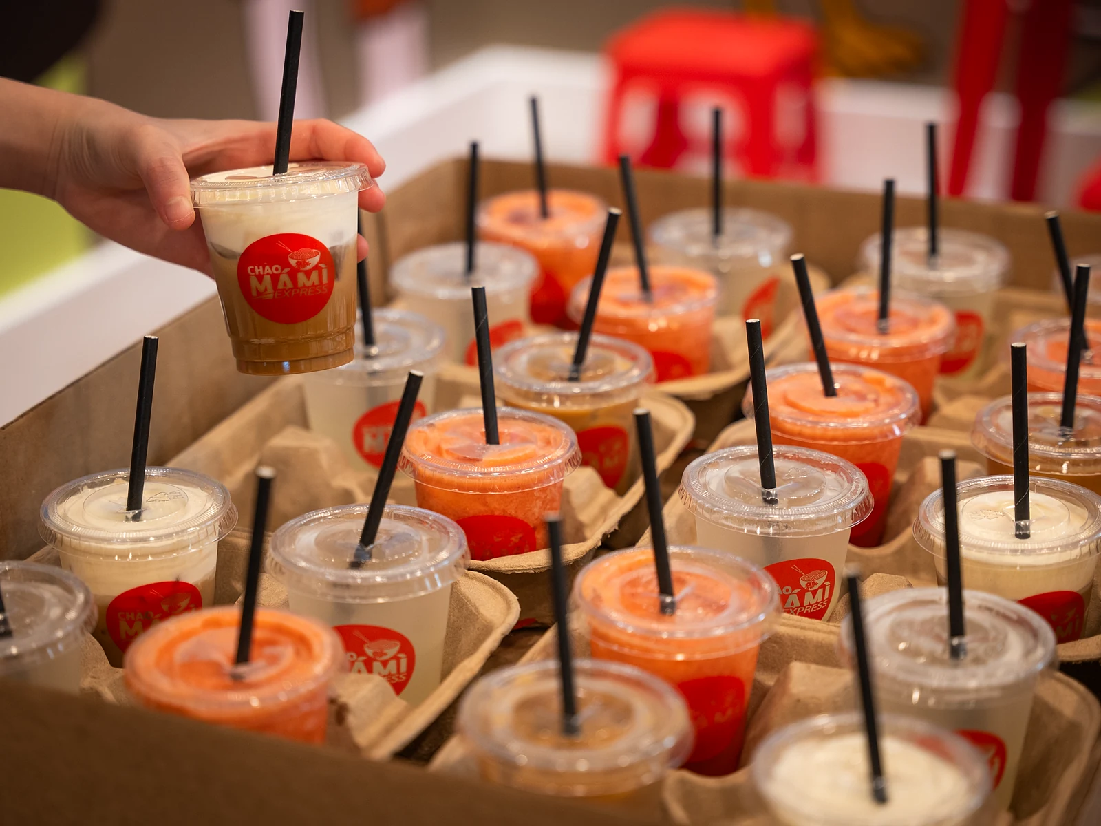 Mini Drink Box catering — trays of Vietnamese iced drinks being packed